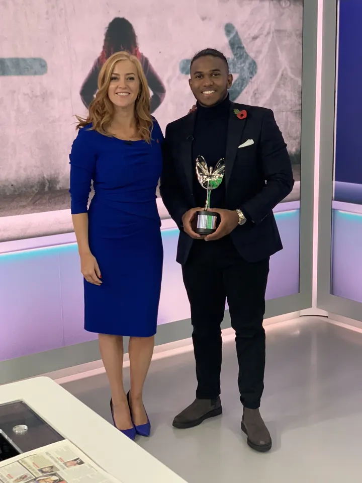 With the Pride of Britain trophy